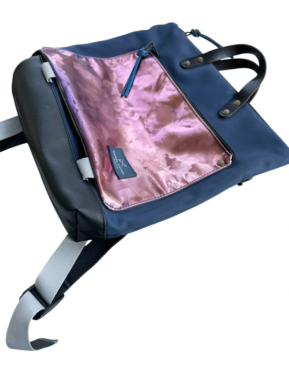 Daniel Chong Madrid • Waterproof Book Holder Backpack Metallic Rose/Navy